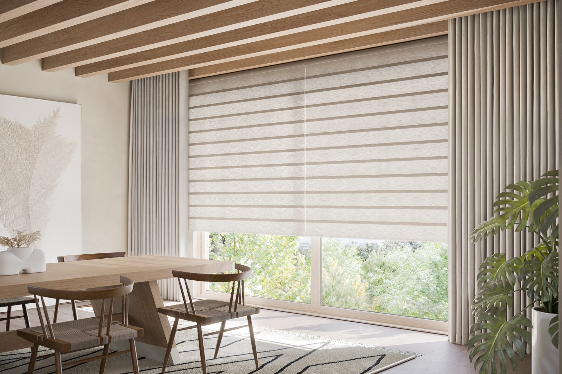 Custom drapery panels framing a wide window with a banded shade in a Kansas City dining room