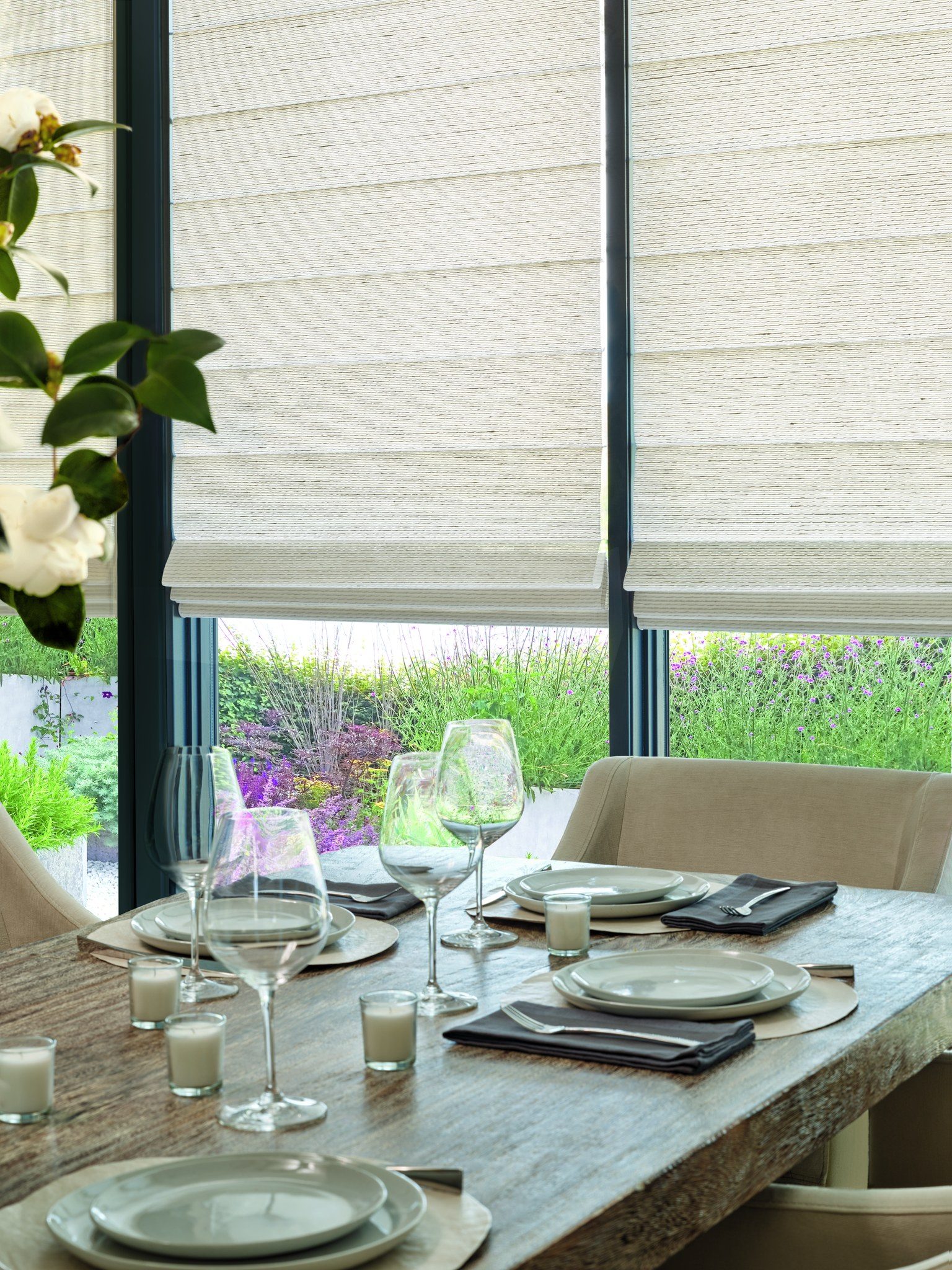 Soft fold Roman shade in a designer fabric over a Kansas City dining table