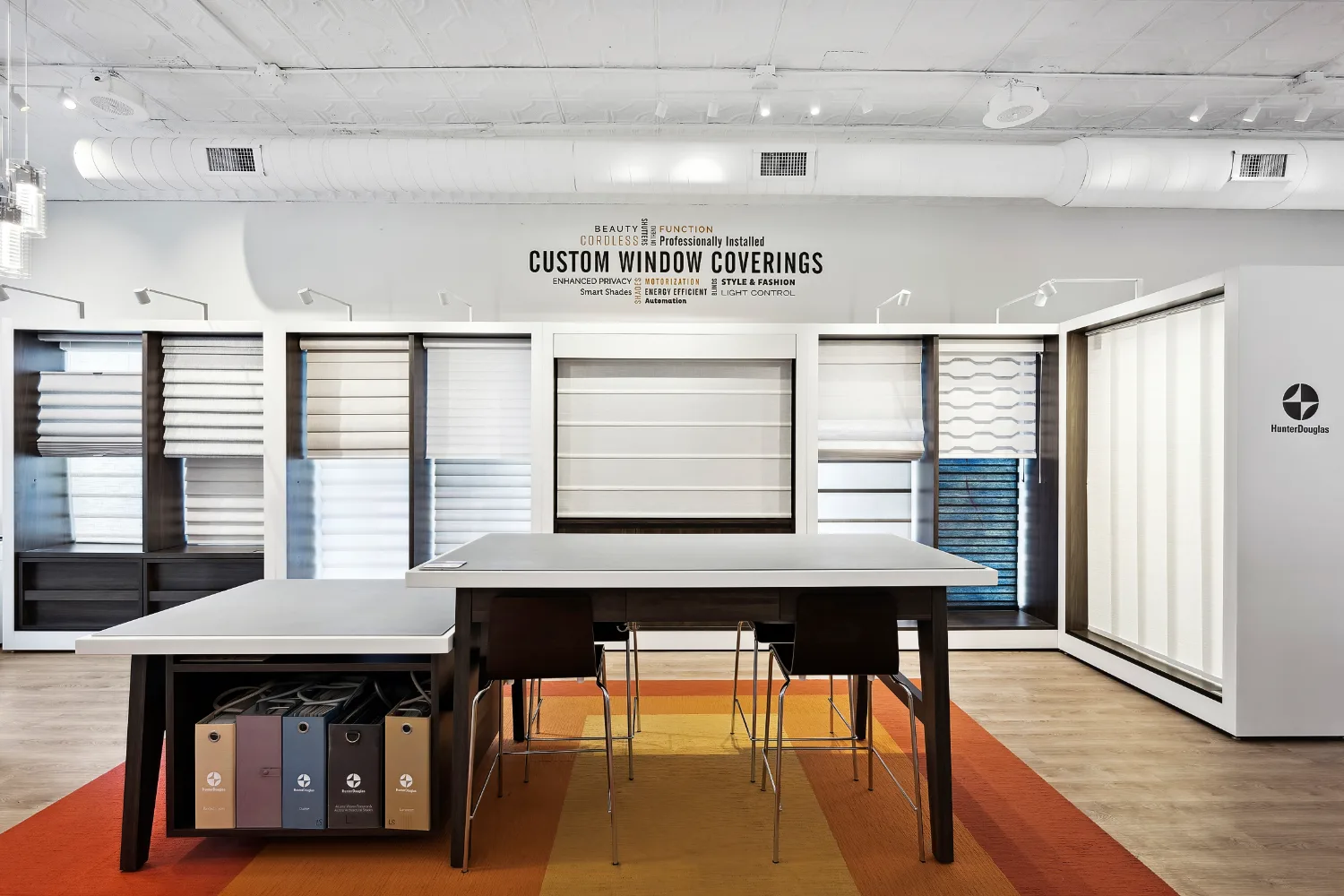 Custom window coverings display wall with shades and blinds