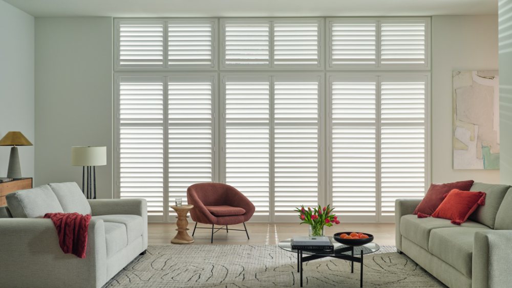 White plantation shutters in a bright living room